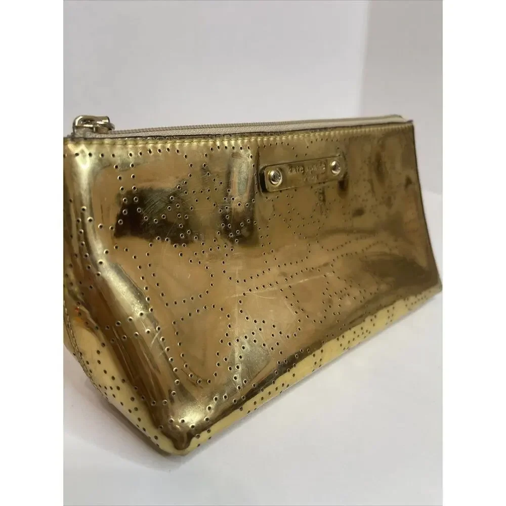 - KATE SPADE New York LITTLE SHILOH Metro Spade Gold Shimmer cosmetic bag